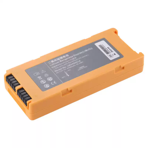 Orange LM34S001A-reference D1 battery source photo showing Li-MnO2, 12 V, 4200 mAh label and side contacts