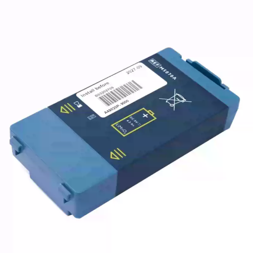 Photographed M5070A-reference AED battery pack with blue case and LiMnO2 DC 9 V, 4.2 Ah label